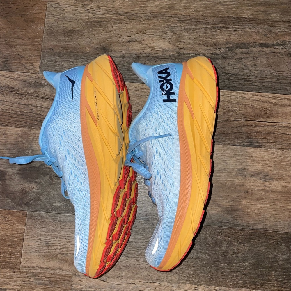 Hoka womens running shoes clifton 8. Size 9. Blue and orange